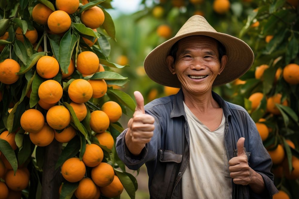 Thai farmer orange clothing produce.