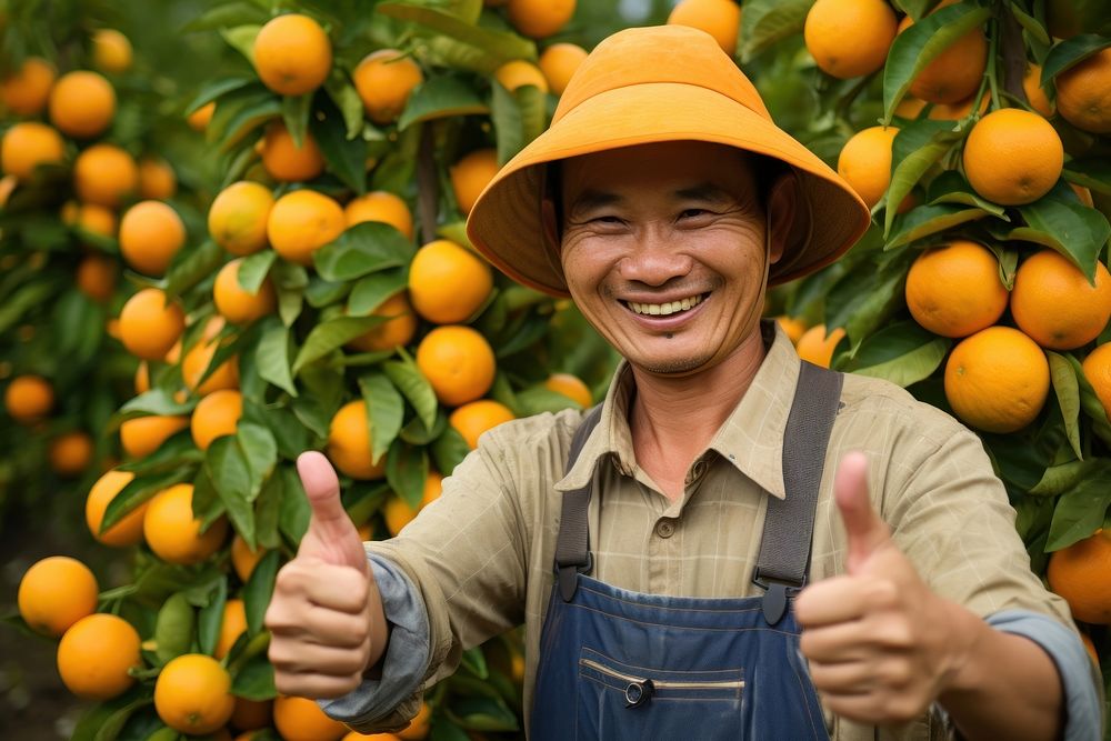 Thai farmer orange produce finger.