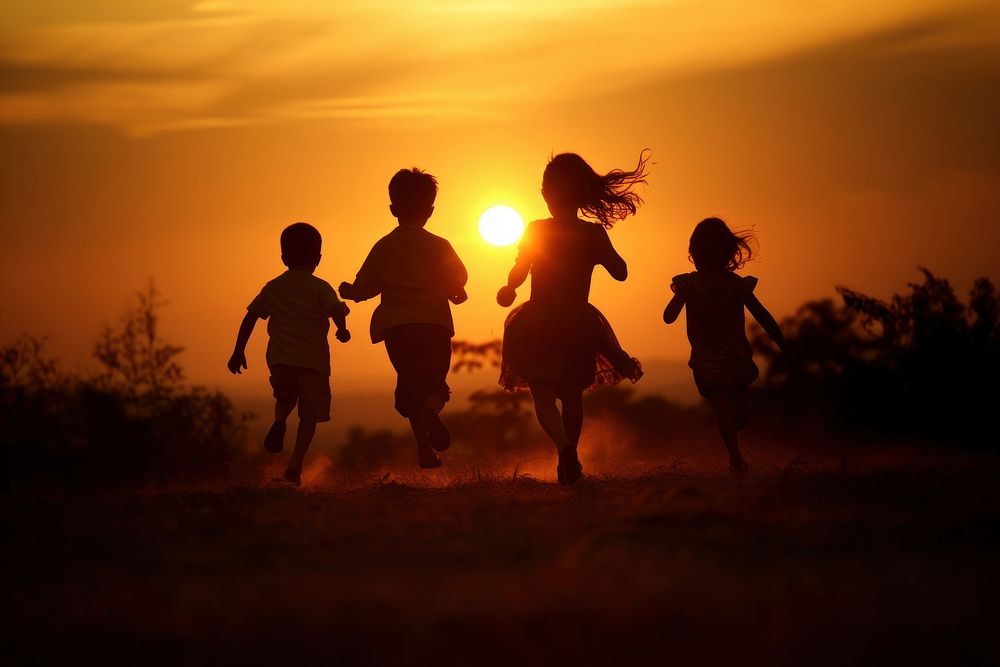 Kids running silhouette photography outdoors sunset nature.