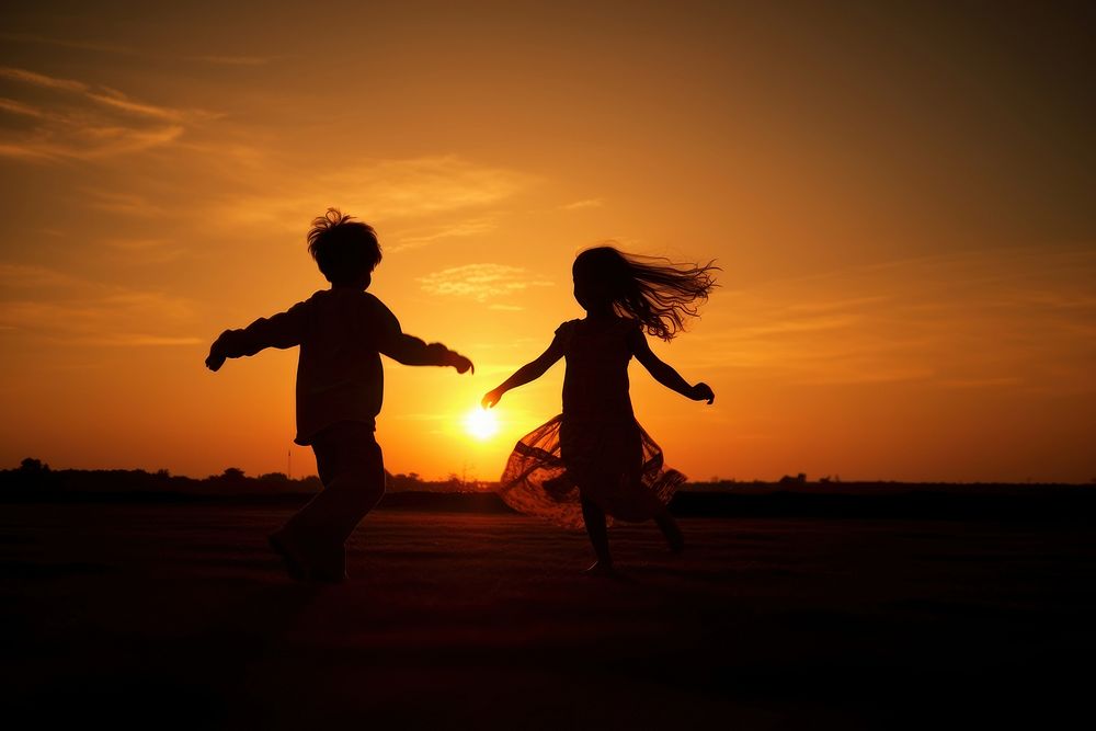 Kids running silhouette photography backlighting outdoors sunset.