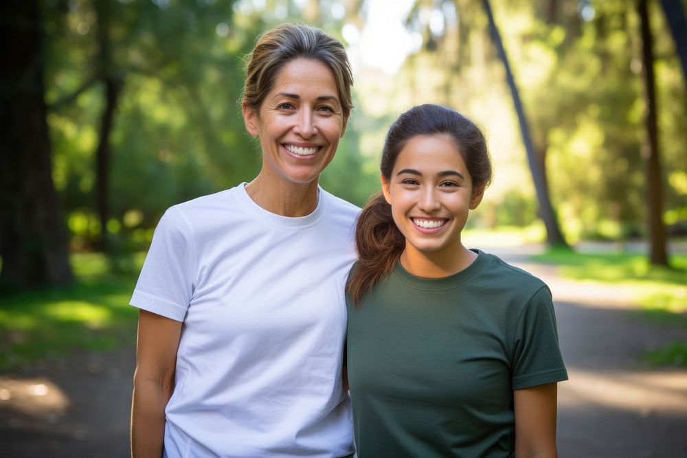 Smiling mother and daughter t-shirt clothing apparel.