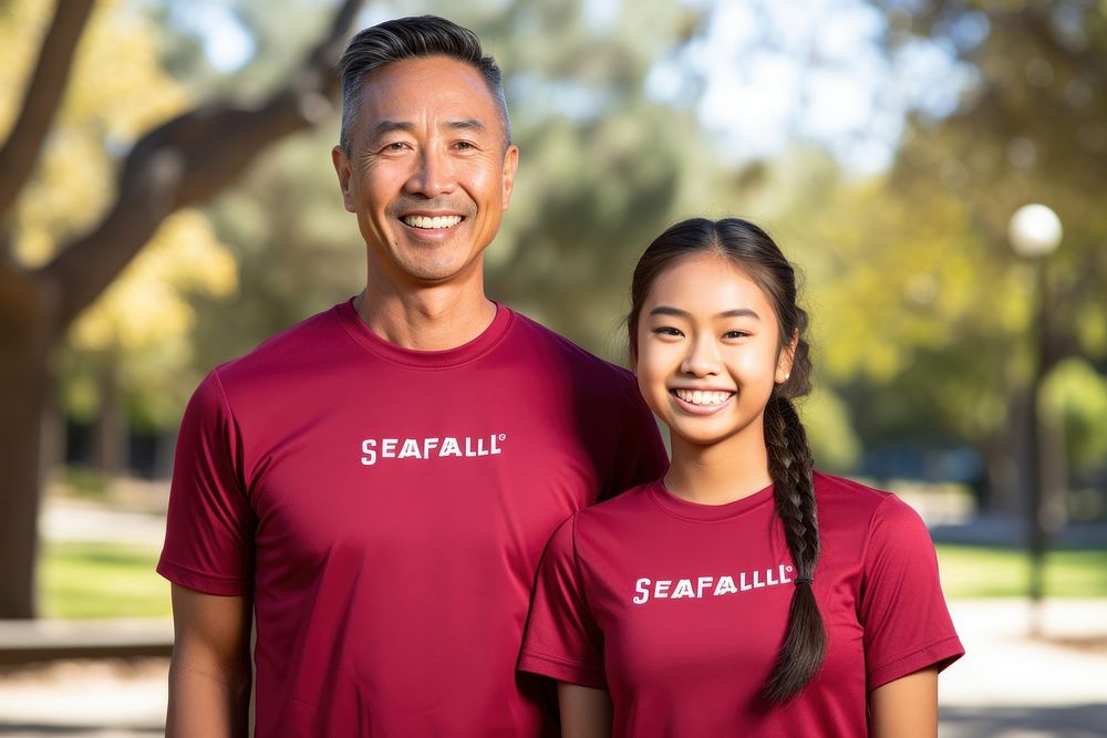 Smiling father and daughter t-shirt clothing apparel.