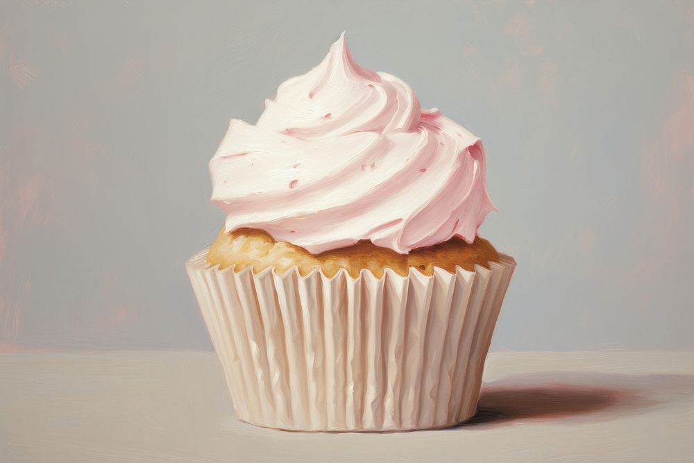 Close up on pale pink cupcake dessert cream creme.