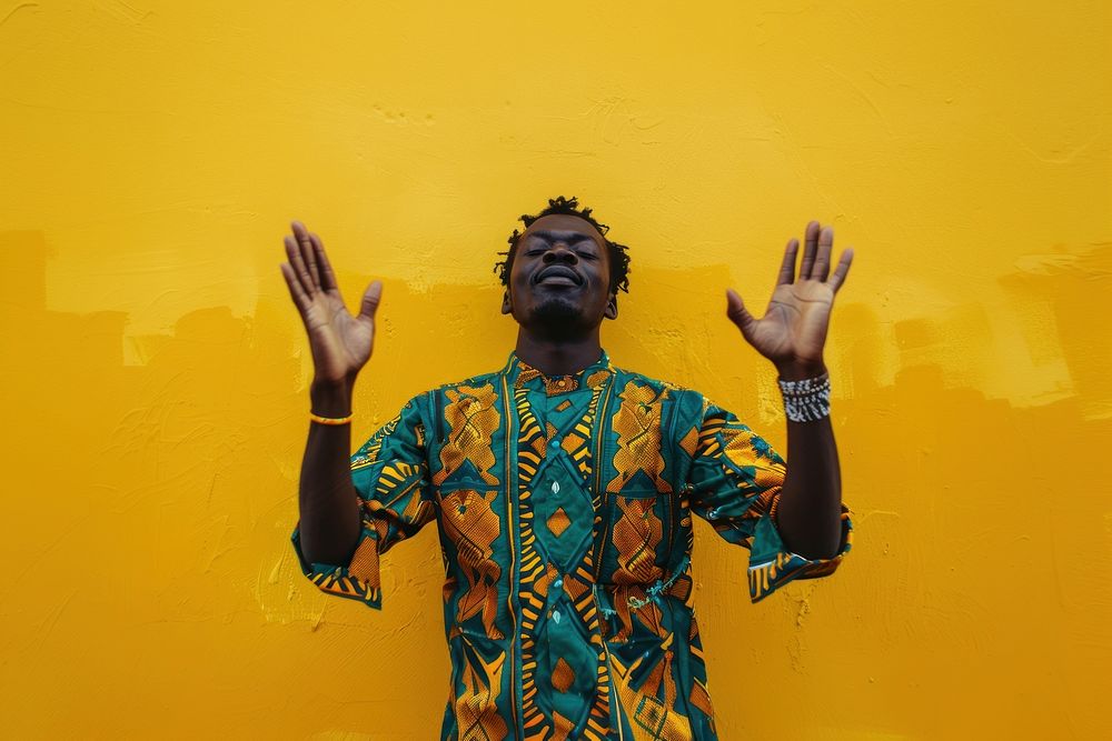 African man apology hands performer clothing apparel.