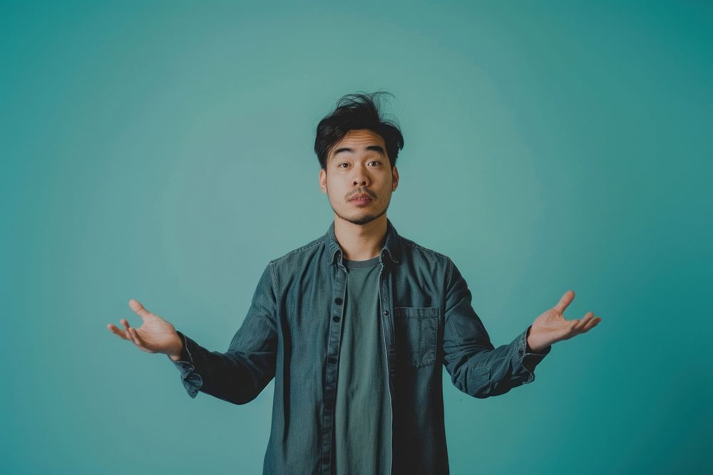 Asian man apology hands portrait photography performer.