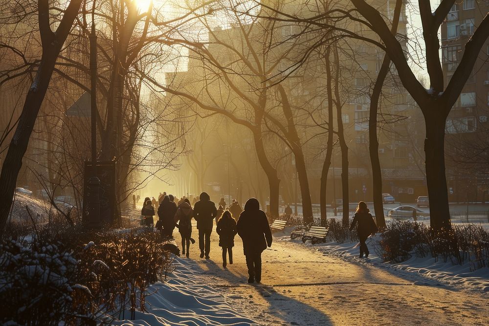 People walking on a city walk path landscape sunlight outdoors.