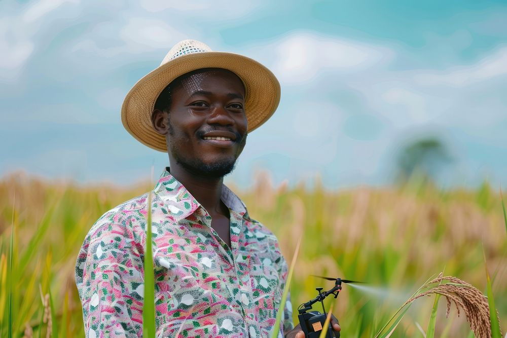 Black South African man farmer field clothing outdoors.