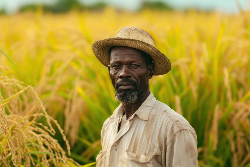Black South African man farmer field countryside outdoors.