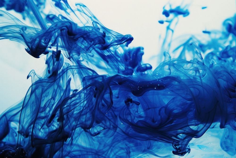 Blue ink wave flowing underwater blue backgrounds creativity.