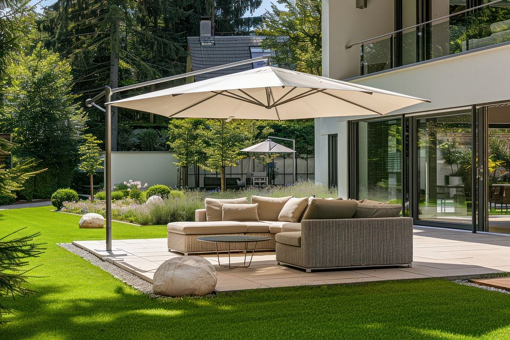 Photo of luxury lawn outside sitting area architecture furniture building.