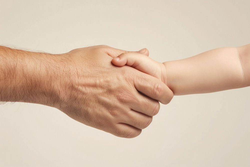 Baby girl handshake human person wrist.