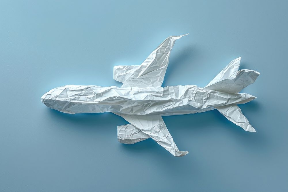 Airplane in style of crumpled paper origami person.