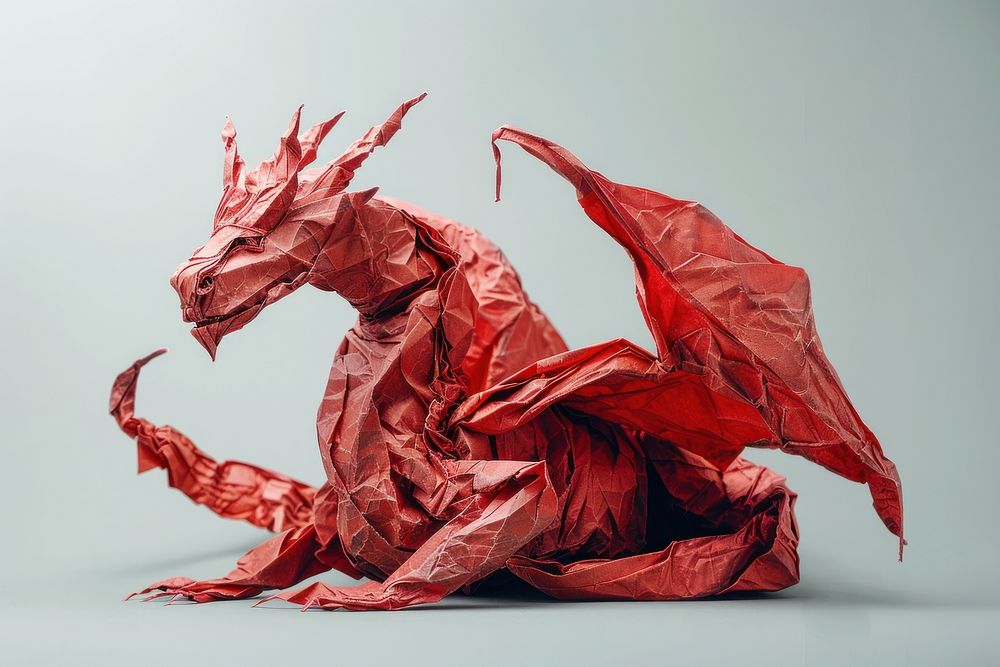 Dragon in style of crumpled paper clothing apparel.