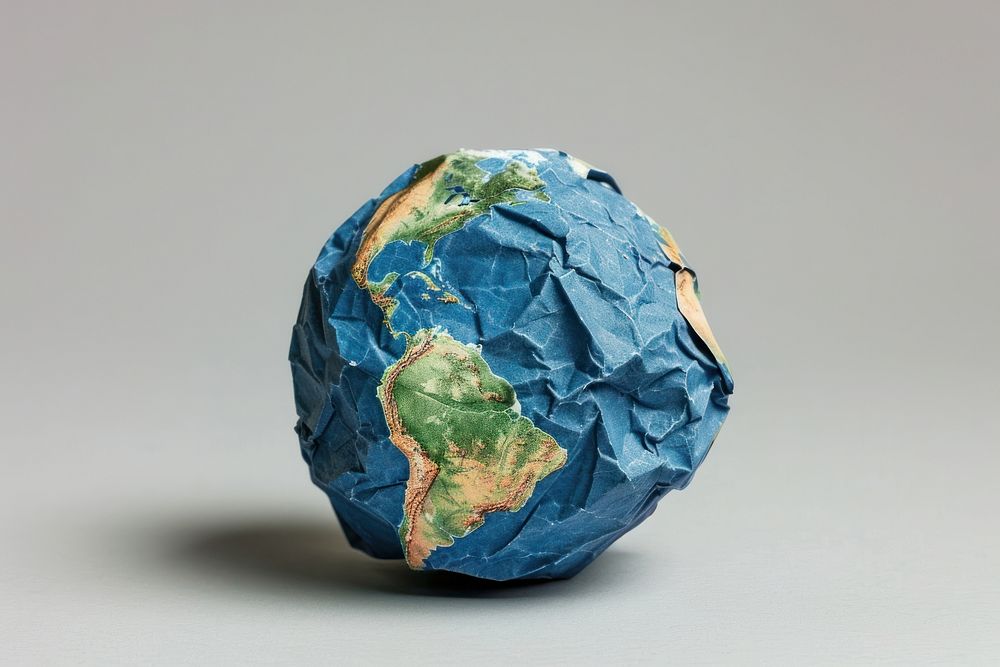 Earth in style of crumpled astronomy universe sphere.