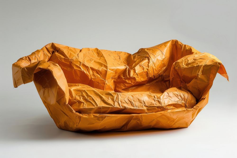 Sofa in style of crumpled paper furniture cushion.