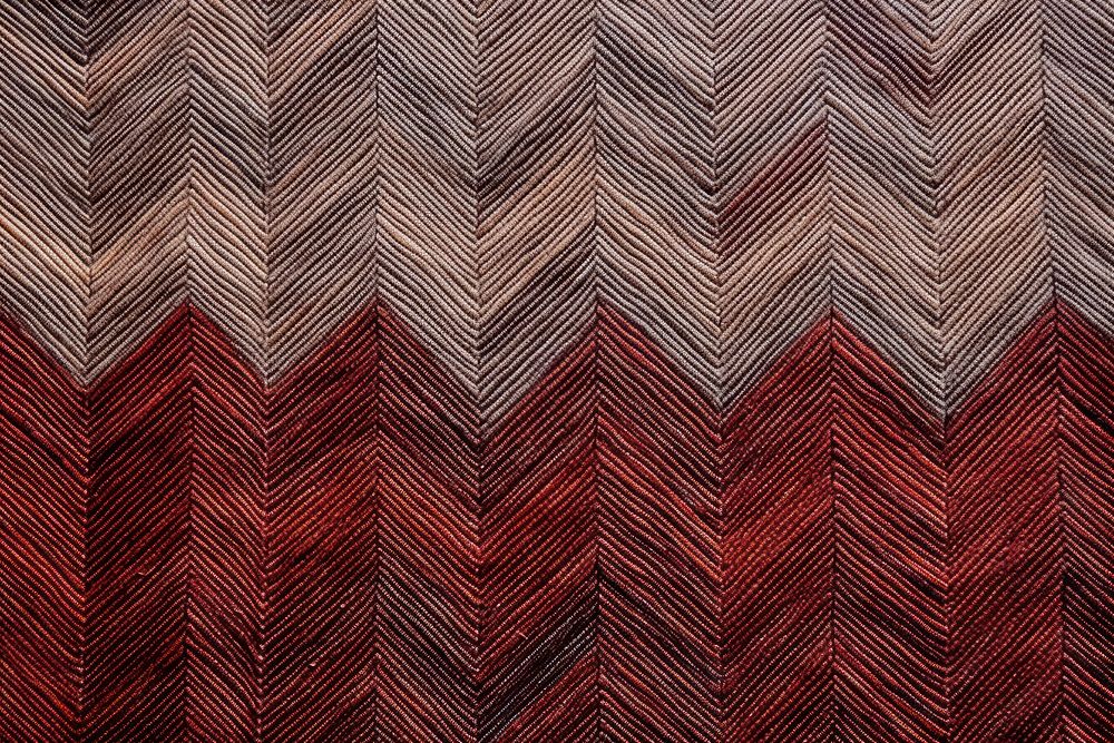 Top view photo of a herringbone pattern texture maroon person.
