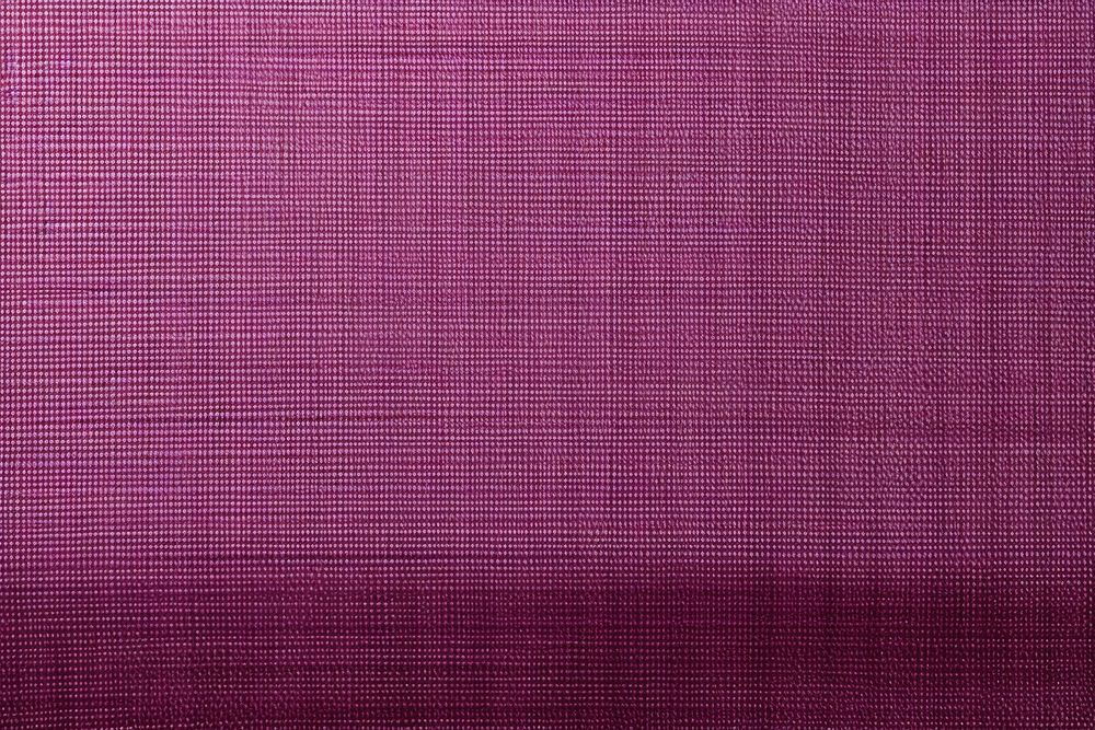 Top view photo of a plain fabric texture purple velvet linen.