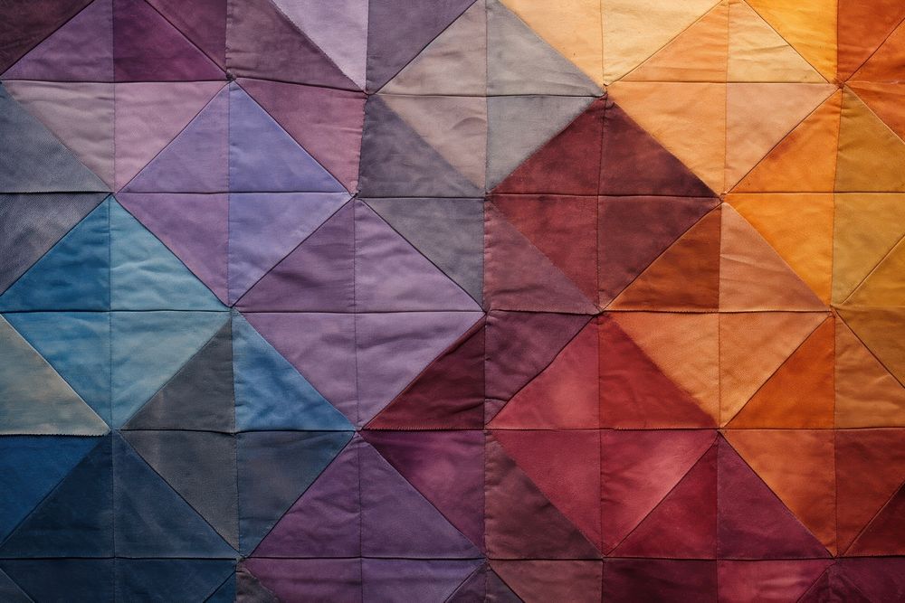 Top view photo of a quilt pattern texture patchwork.