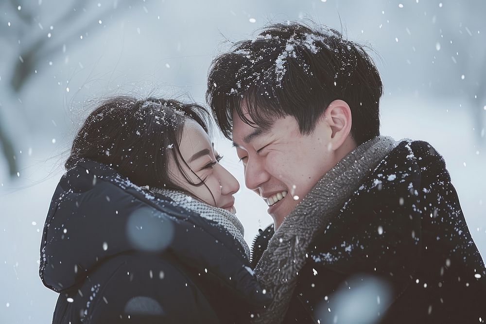 Happy korean couple photo snow photography.
