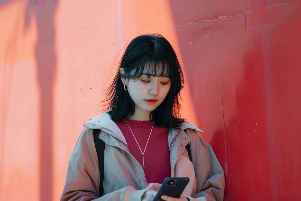 Girl holding cellphone photo accessories photography.