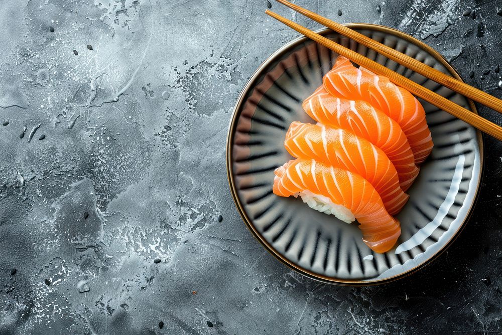 Sashimi chopsticks seafood salmon.