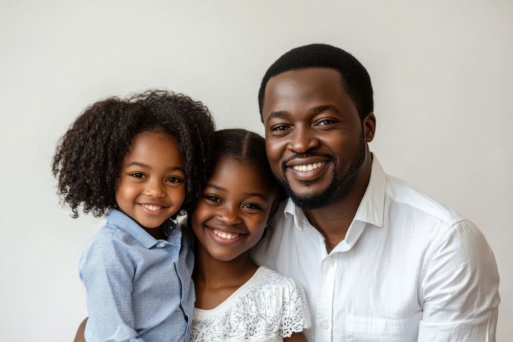 Parents and children smile portrait together.