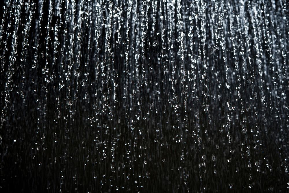 Black rain falling texture background effect.