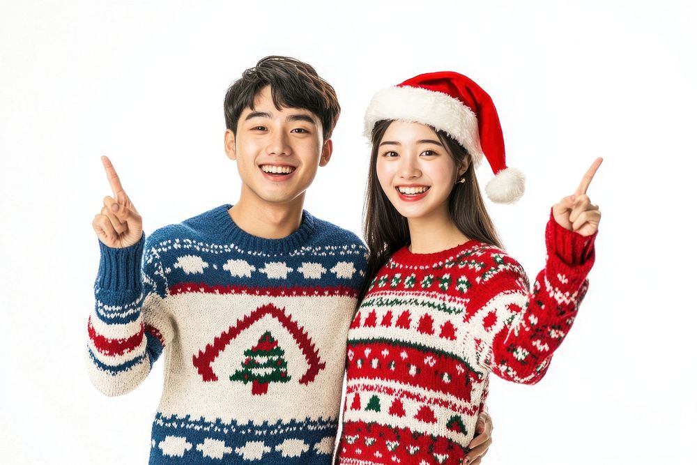 Young Asian couple wearing Christmas sweaters happy christmas clothing.