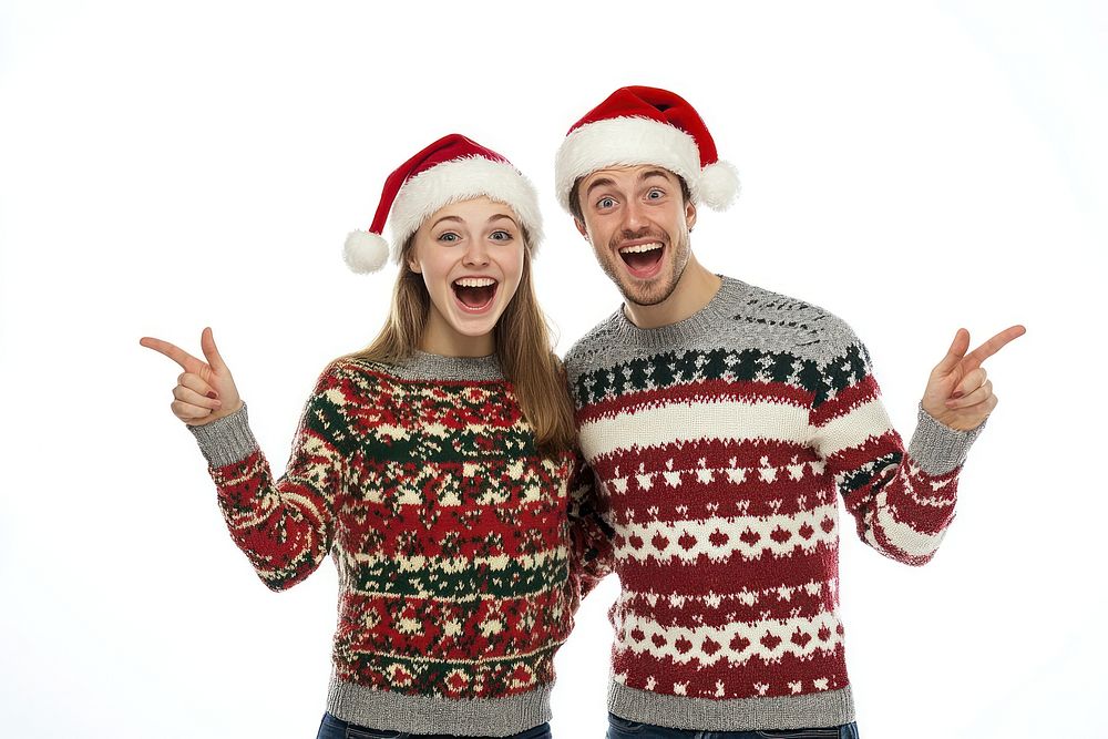 Young couple wearing Christmas sweaters christmas happy santa.