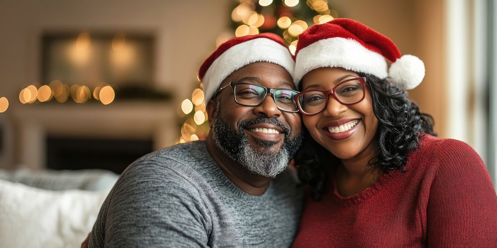 Christmas african american couple happy hats glasses.