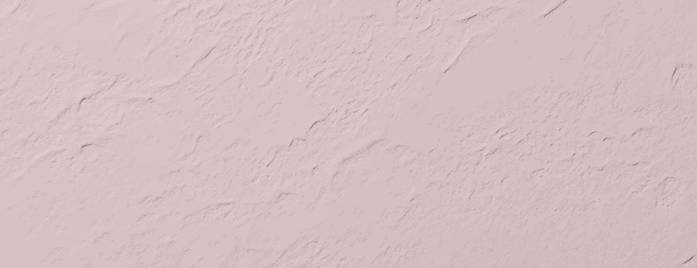 The background is a soft pink background with a textured, plaster-like surface. The background has a subtle, light pink…