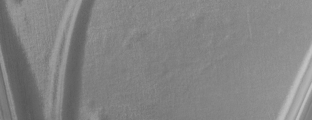 Gray textured background with subtle curves. The background has a smooth, metallic gray appearance, creating a sleek, modern…