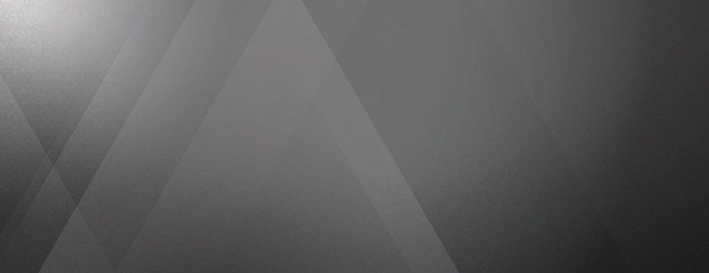 Gray geometric background with overlapping triangles. The background is smooth and features a gradient of gray tones…