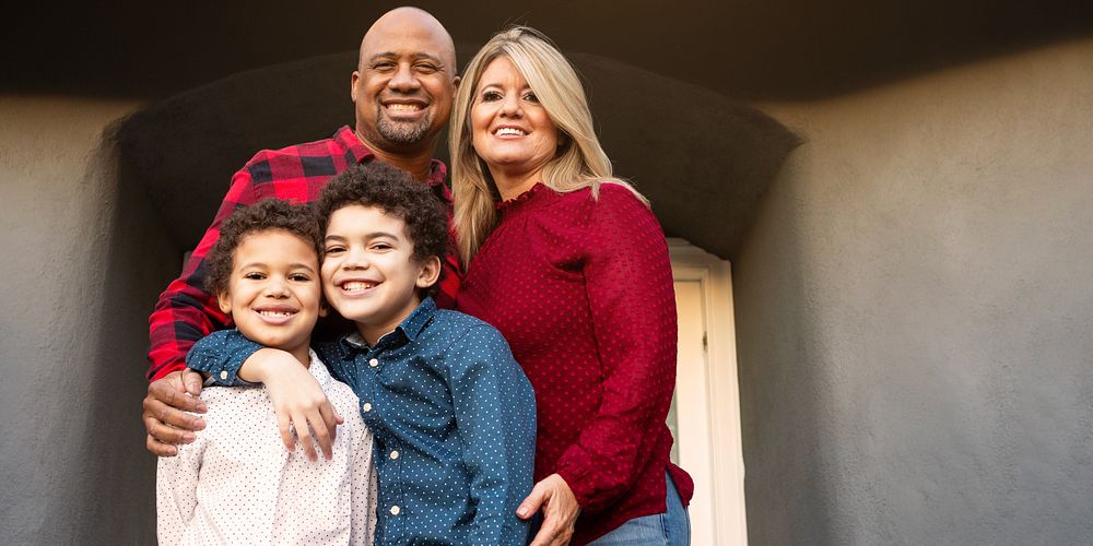 Group of happy diverse family standing together. Group of diverse family in casual attire standing outdoor. Happy diverse…