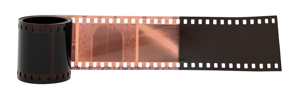 A roll of film with exposed negatives. Film roll showing negatives. Photography film roll with negatives. Film negatives on…