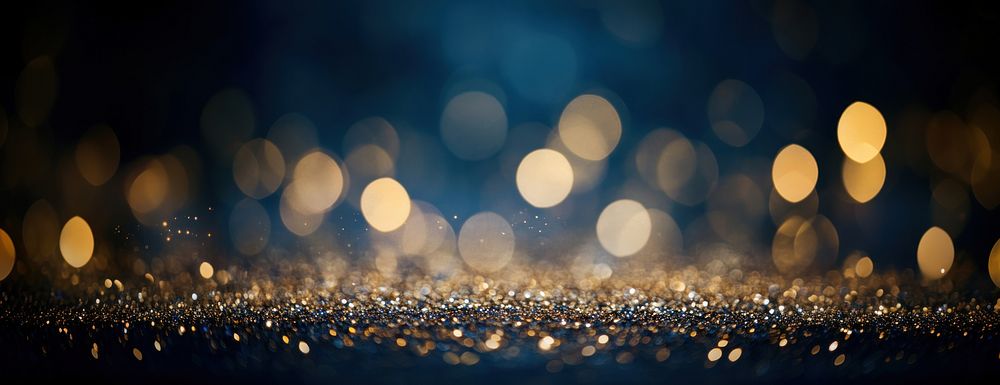 Golden glitter and small circles with sparkles lights background abstract.