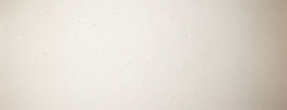 A flat texture of very superwhite cardboard wall background textured.