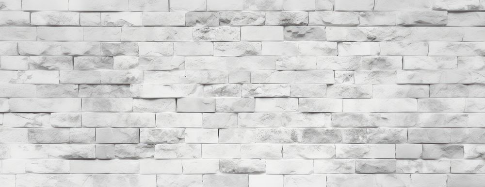 Minimalist white brick wall texture pattern architecture.