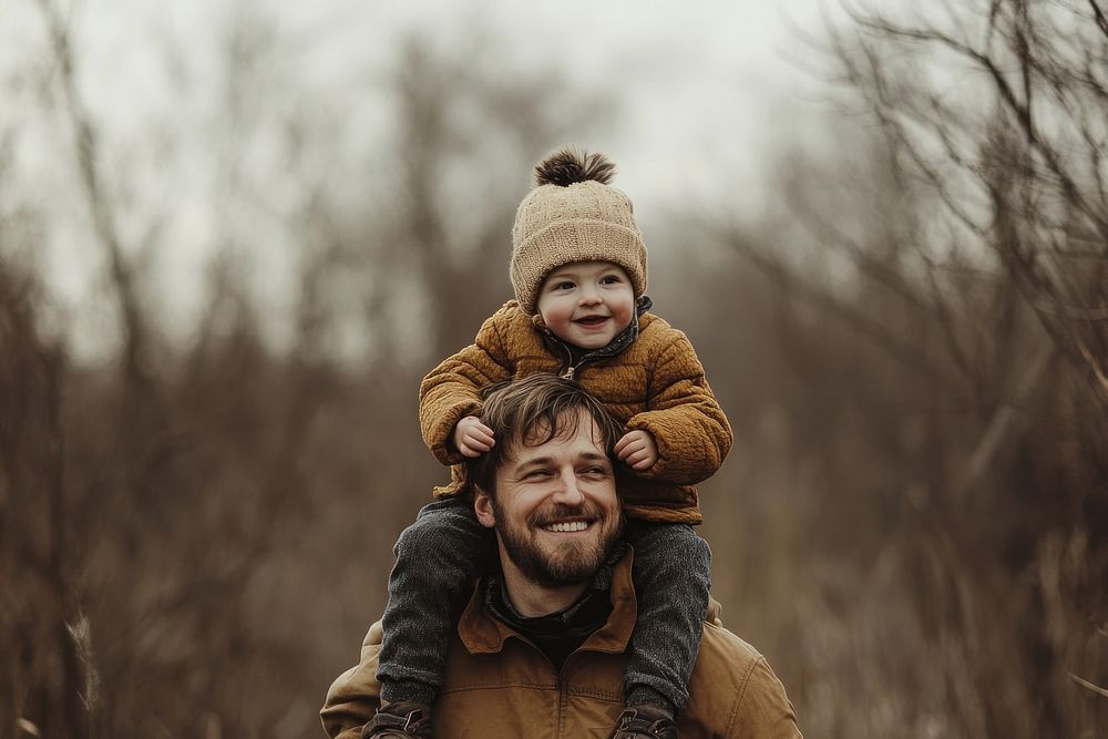 Happy father and son nature background clothing.