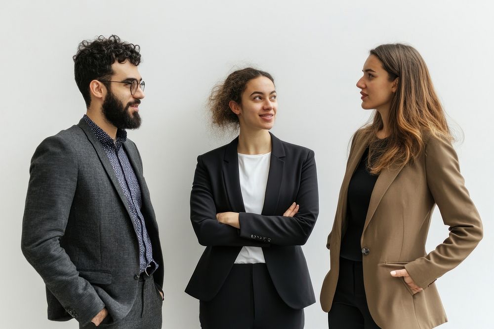 Three business people talking person conversation professional.