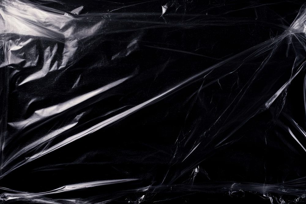 Plastic wrap texture background black blackboard.