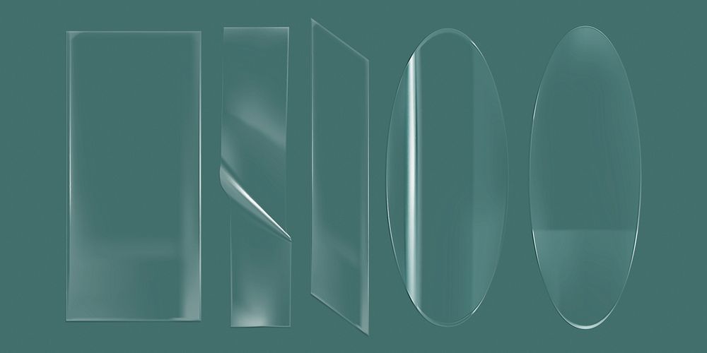 Abstract glass shapes on a green background. Glass shapes include rectangles and ovals. The glass reflects light, creating a…