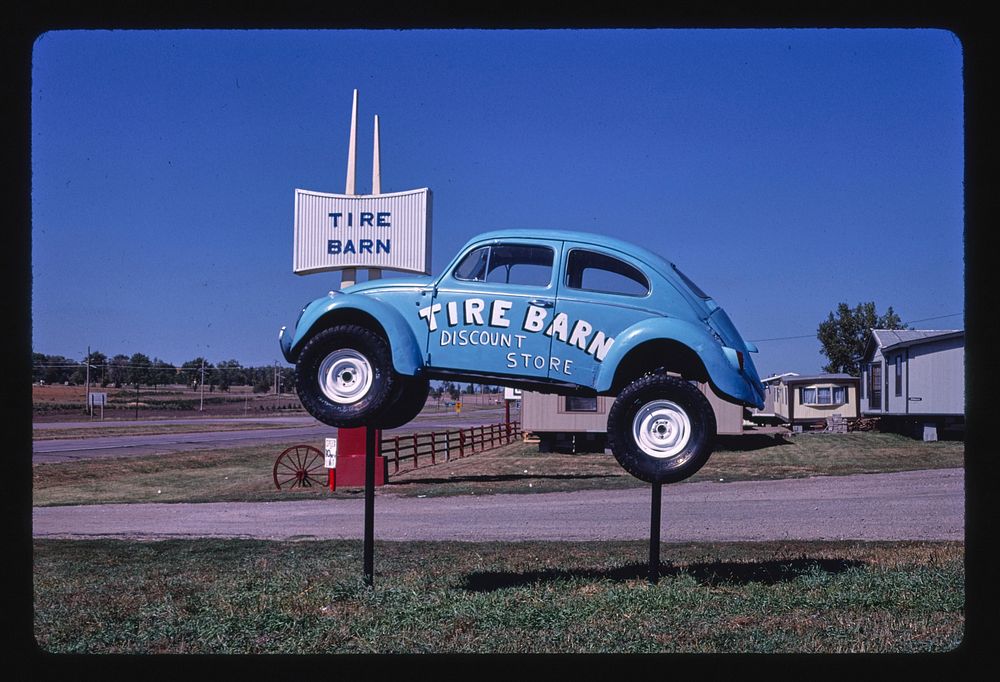 Tire Barn sign, Route 50, Yankton, South Dakota (1987) photography in high resolution by John Margolies. Original from the…