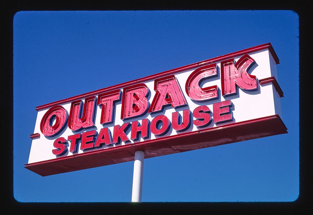 Outback Steakhouse sign, Yuma, Arizona (2003) photography in high resolution by John Margolies. Original from the Library of…