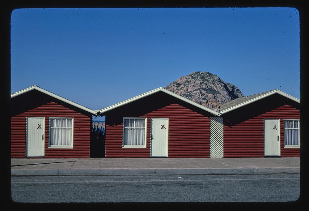 Log Cabin Motel, diagonal view, 830 Market Street, Morro Bay, California (1985) photography in high resolution by John…