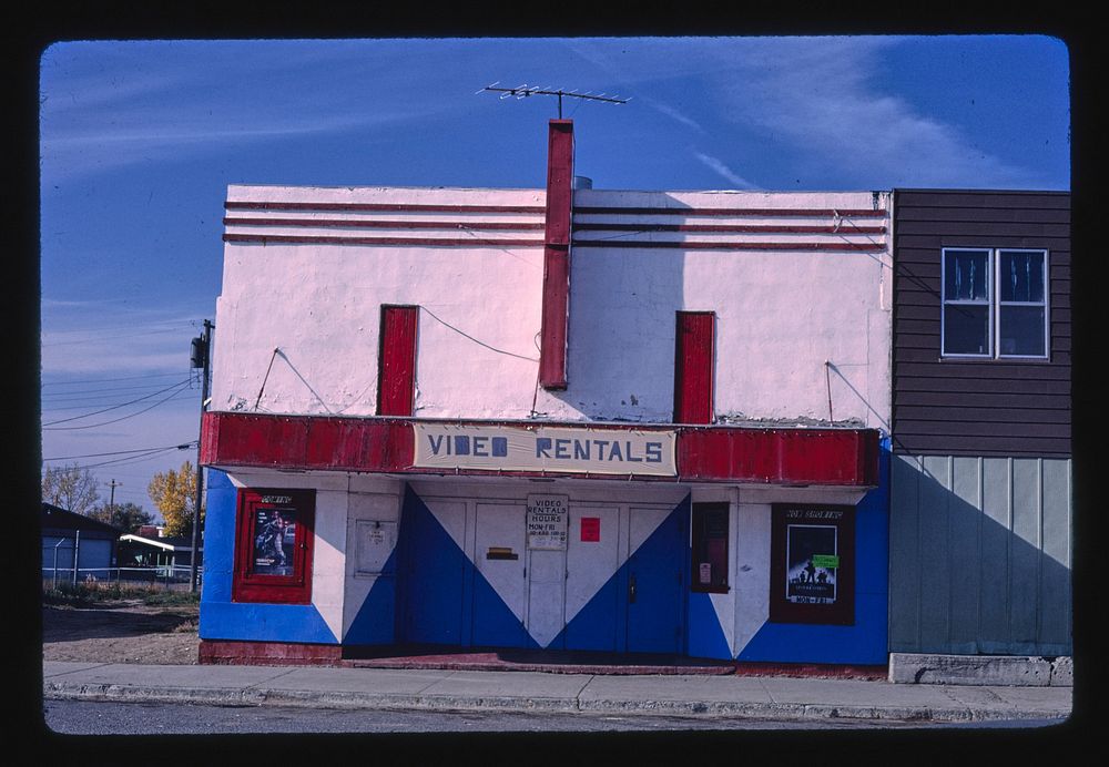 Glacier Theater, angle 1, Main Street, Browning, Montana (1987) photography in high resolution by John Margolies. Original…
