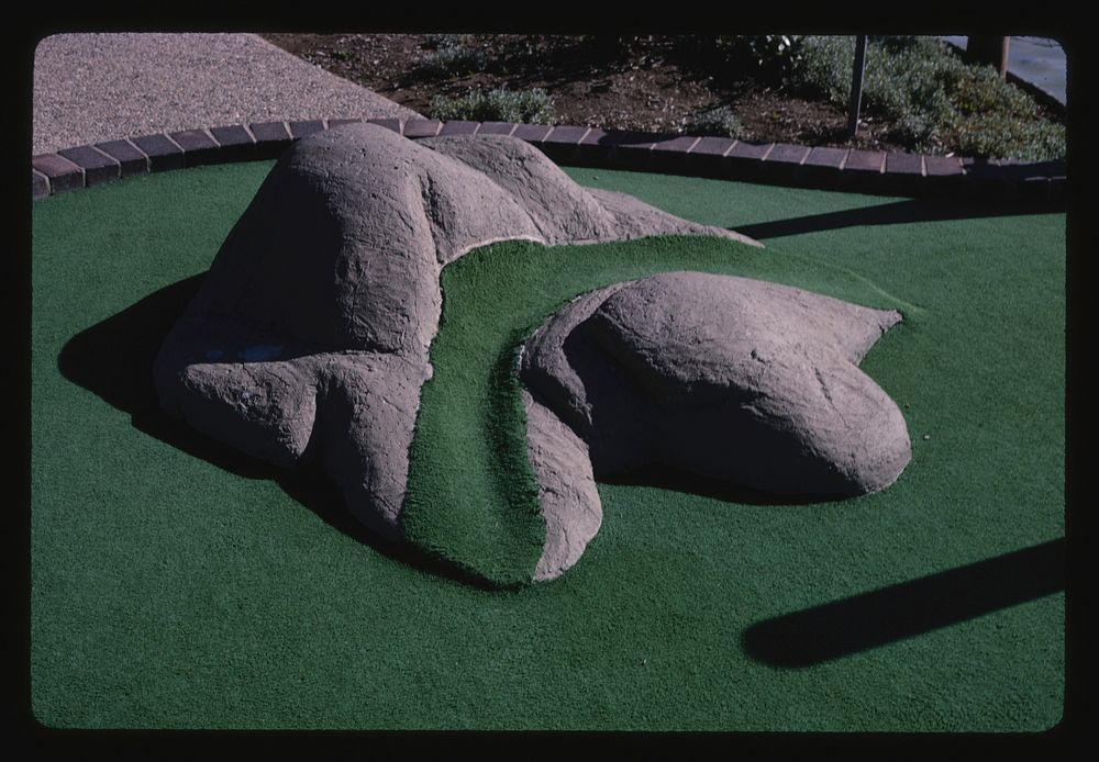 Rock hazard, Mulligan's Golf and Games, Ogden, Utah (1991) photography in high resolution by John Margolies. Original from…