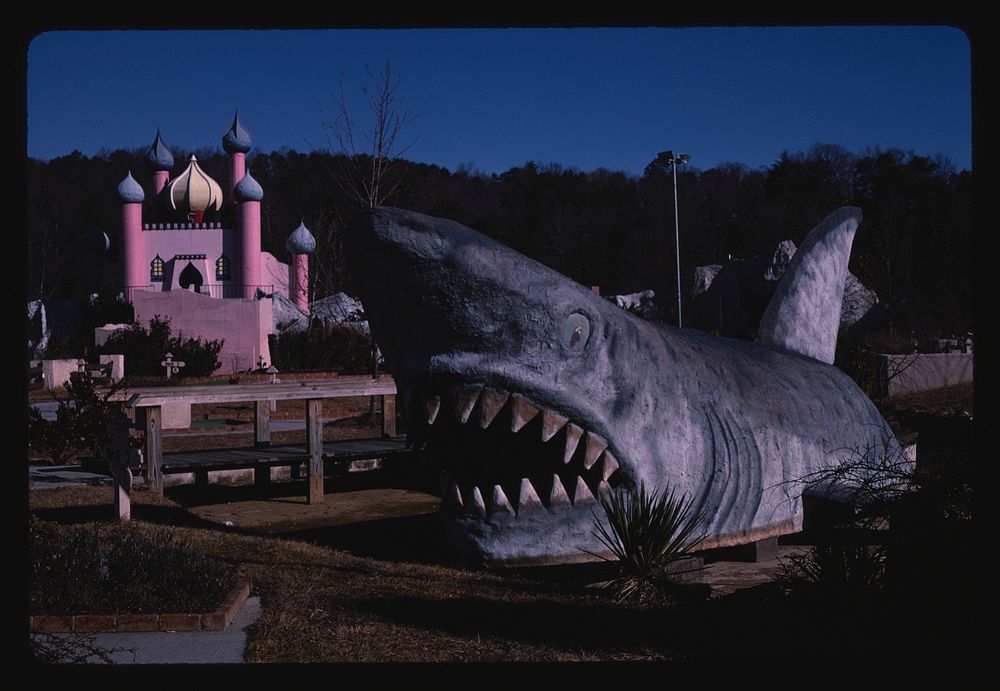 Castle and shark, Adventure Golf, Route 441, Pigeon Forge, Tennessee (1984) photography in high resolution by John…