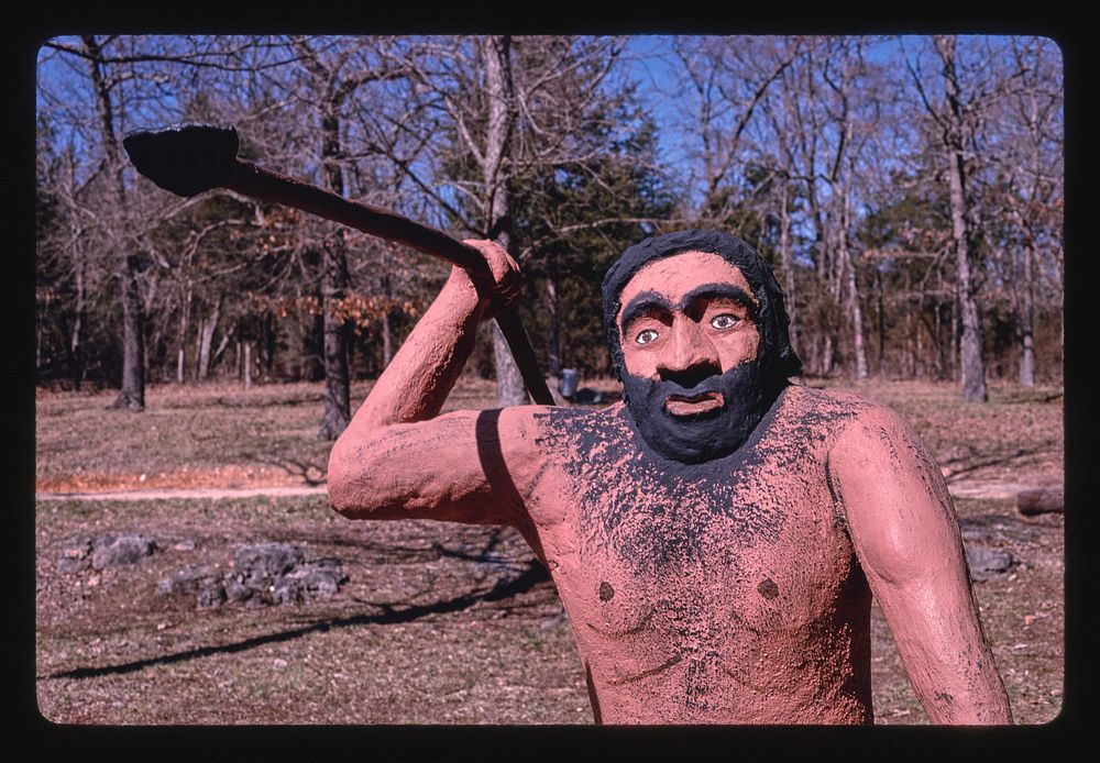 Caveman with spear, Dinosaur World, Eureka Springs, Arkansas (1994) photography in high resolution by John Margolies.…