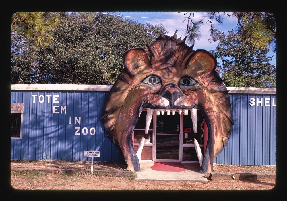 Entrance horizontal, Tote Em in Zoo, Wilmington, North Carolina (1985) photography in high resolution by John Margolies.…